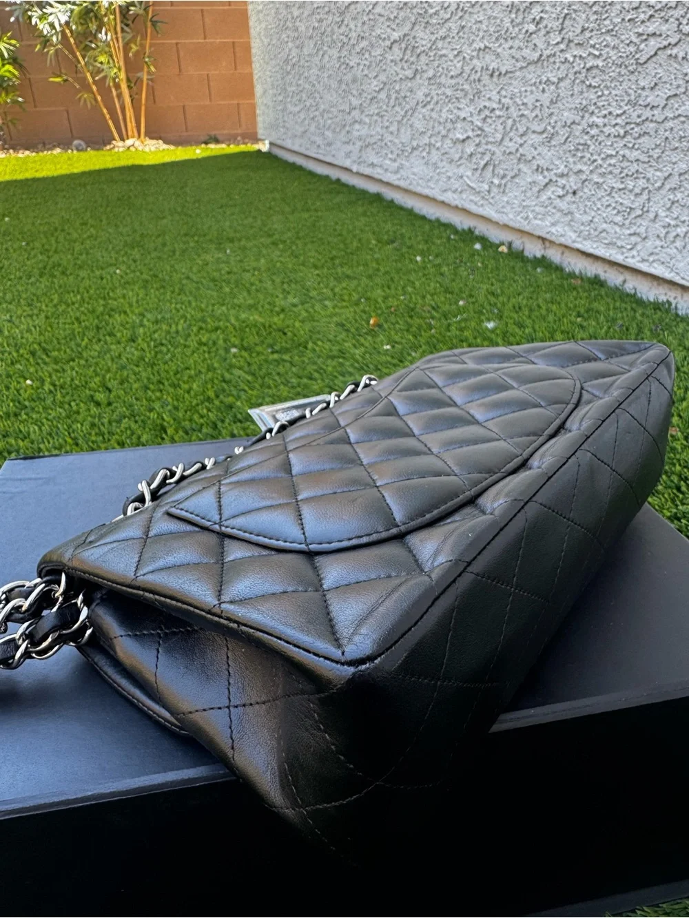 CHANEL Black Quilted Lambskin Shoulder Bag with Silver CC Lock